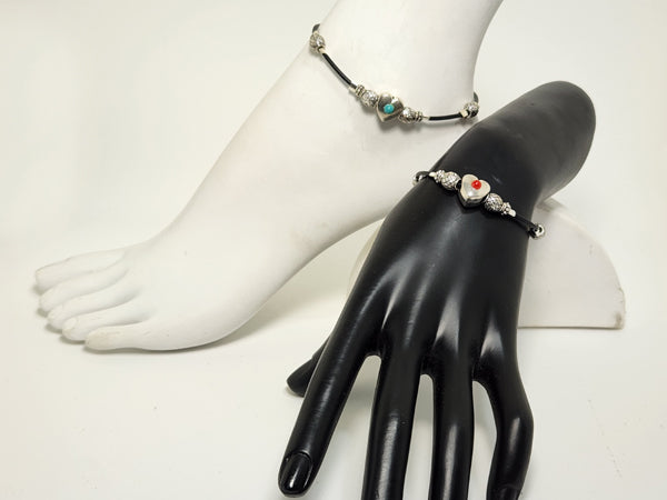 ANTIQUE PUFF HEART WITH TURQUOISE STONE AND STERLING SILVER BRANKLET