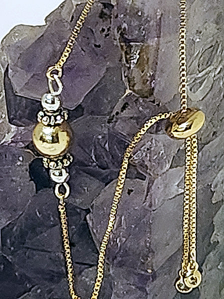 LARGE 18k GOLD BEAD WITH STERLING SILVER OVER HEMATITE ON AN ADJUSTABLE GOLD CHAIN