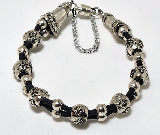 DOUBLE CORD ANTIQUE SILVER FLOWER FACED BRACELET