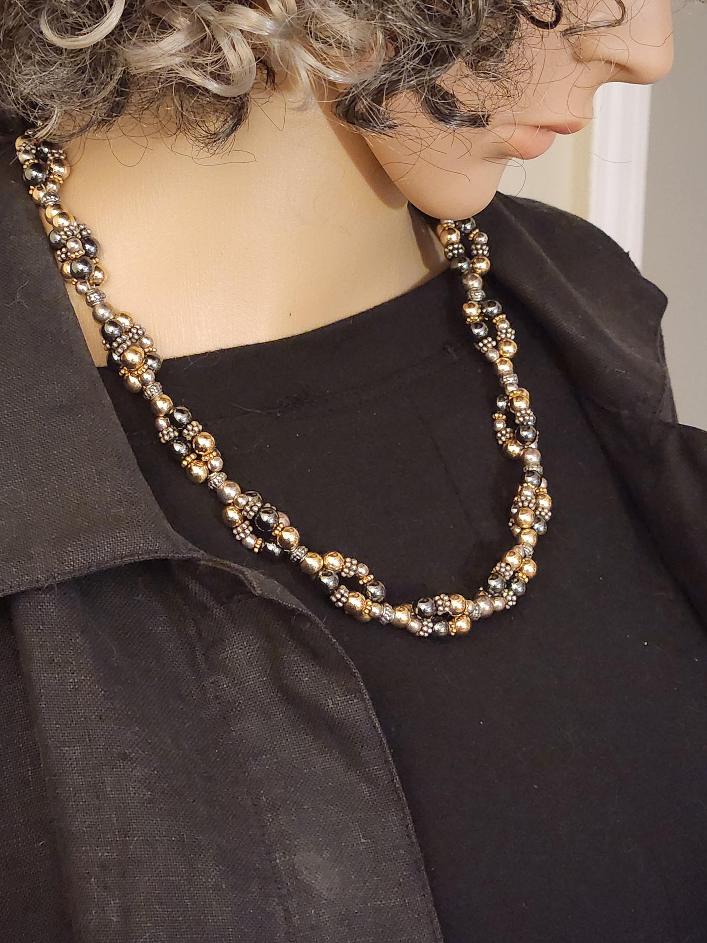 ADJUSTABLE TRIPLE TWIST NECKLACE WITH 18k GOLD, STERLING SILVER AND GRAY HEMATITE