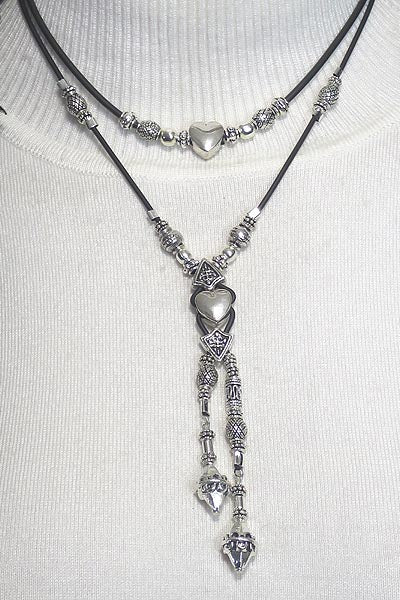 RUBBER CORD LARIAT WITH STERLING SILVER BEADS AND ANTIQUE SILVER HEART